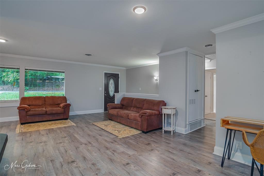 2912 Brookline Drive Shreveport, LA 71119 - Photo 4 of 27 a living room with furniture and a wooden floor