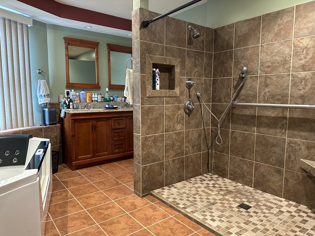 79 Wareham Street Middleboro, MA 02346 - Photo 12 of 27 a bathroom with a sink toilet and shower