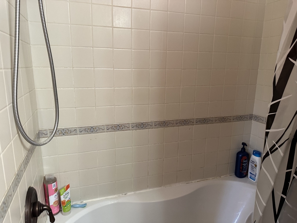 79 Wareham Street Middleboro, MA 02346 - Photo 21 of 27 a bathroom with a bathtub