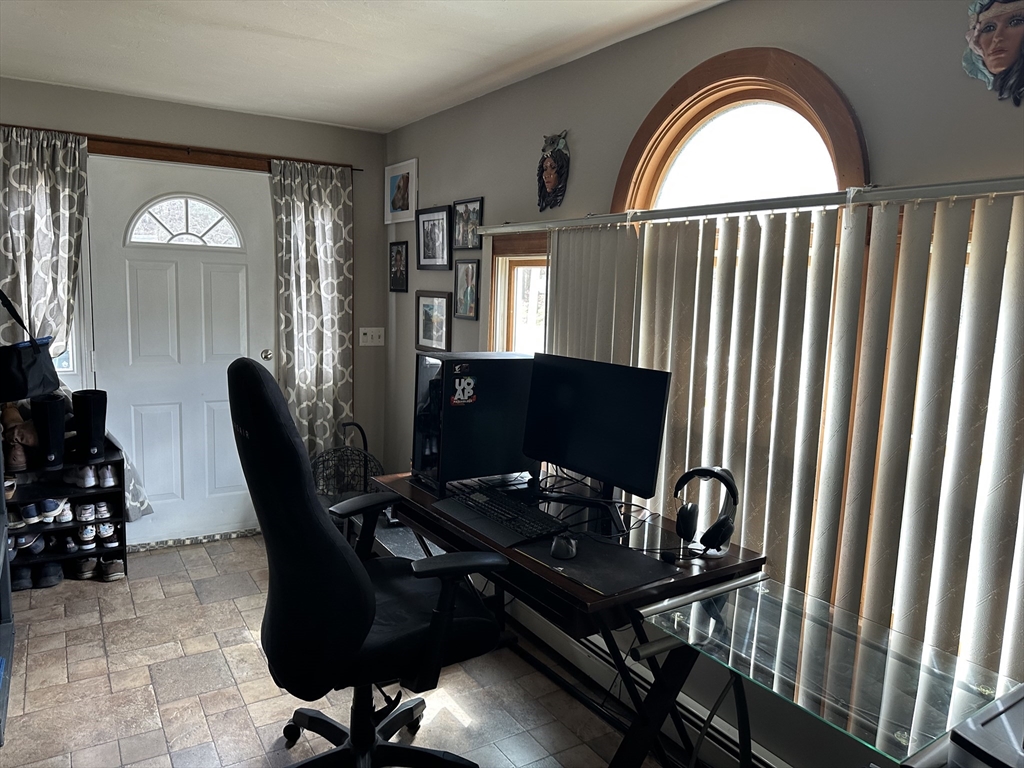 79 Wareham Street Middleboro, MA 02346 - Photo 8 of 27 a view of a workspace with furniture and a window