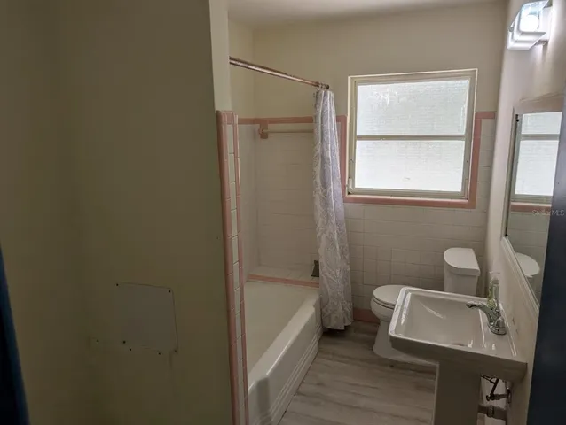 a bathroom with a sink and a toilet