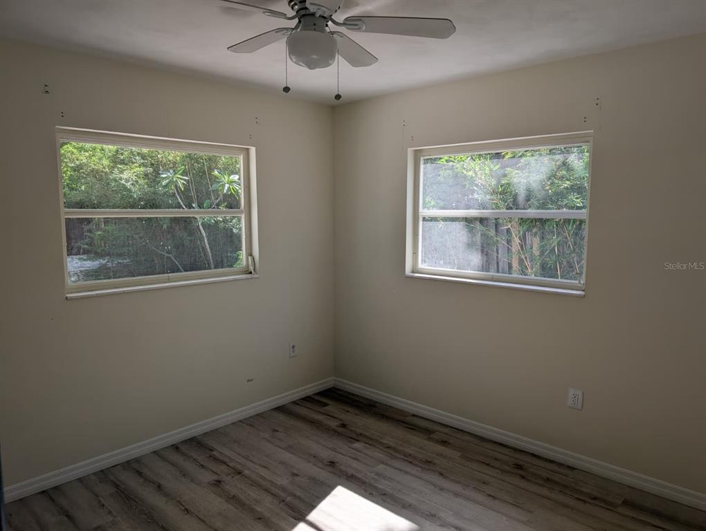 1176 40th Street Sarasota, FL 34234 - Photo 20 of 37 a view of an empty room with a window