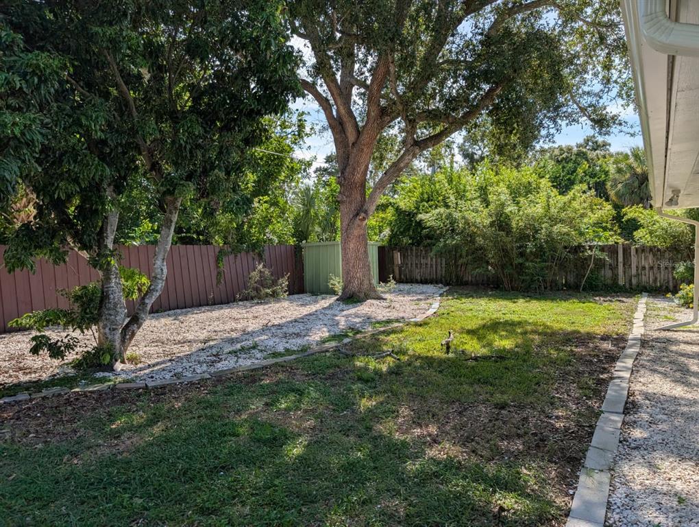 1176 40th Street Sarasota, FL 34234 - Photo 27 of 37 a view of backyard with green space