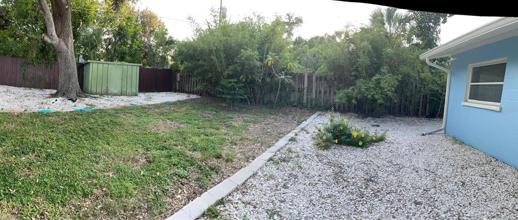1176 40th Street Sarasota, FL 34234 - Photo 37 of 37 a view of a backyard with potted plants