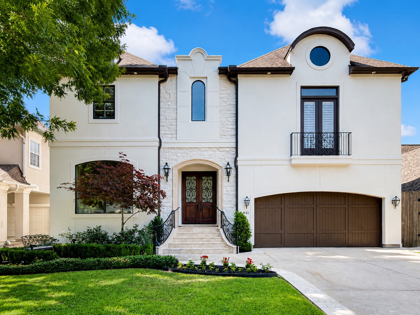 4511 Merrie Lane showcases a timeless Bellaire facade with refreshed stucco and classic architectural detail