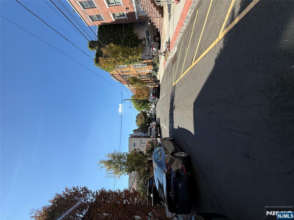 610 Gregory Avenue, Unit 2 Weehawken, NJ 07086 - Photo 18 of 18 a view of street with parked cars