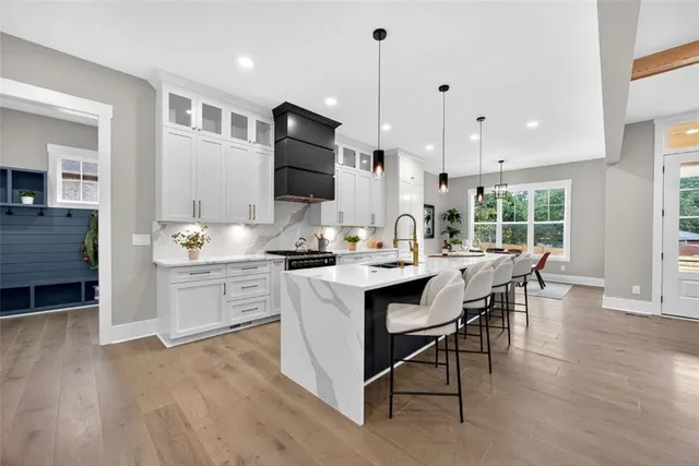 a spacious bedroom with a bed and window