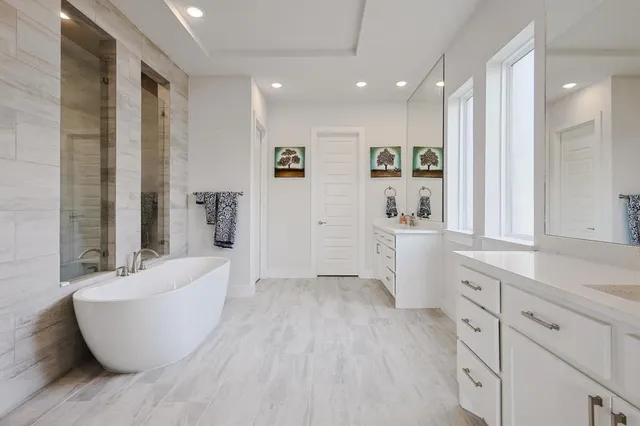 a large room with wooden floor and windows