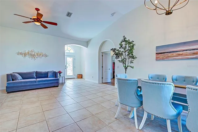 a kitchen with stainless steel appliances a refrigerator and a stove top oven