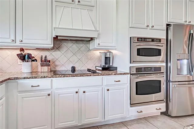 a view of a kitchen with kitchen island dining table and wooden floor