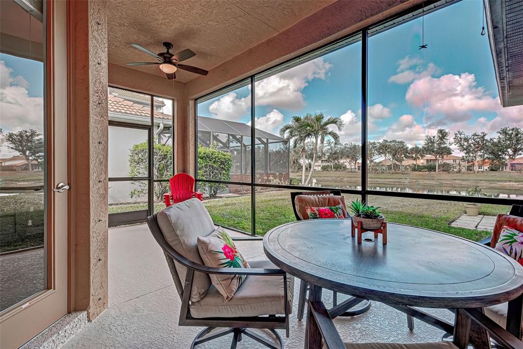 12086 Granite Woods Loop Venice, FL 34292 - Photo 28 of 85 a view of a dining room with furniture window and outside view