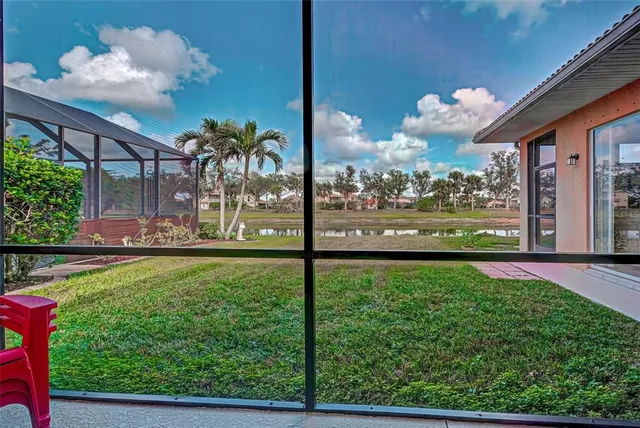 a bathroom with a granite countertop sink toilet and mirror