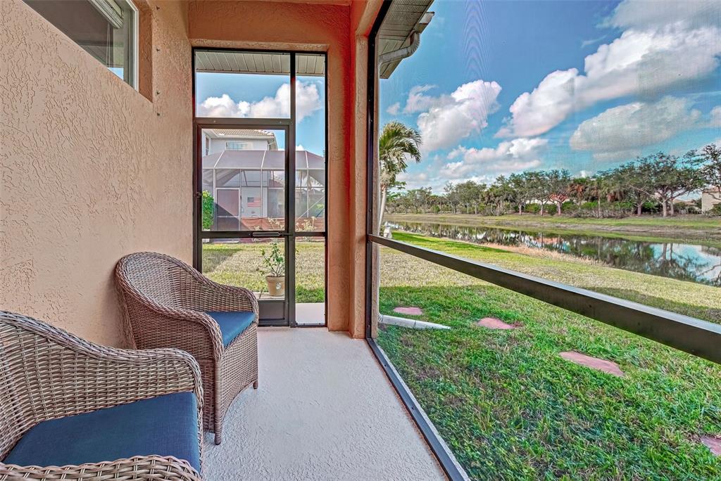 12086 Granite Woods Loop Venice, FL 34292 - Photo 33 of 85 a balcony with furniture