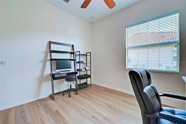 an aerial view of a house with a swimming pool