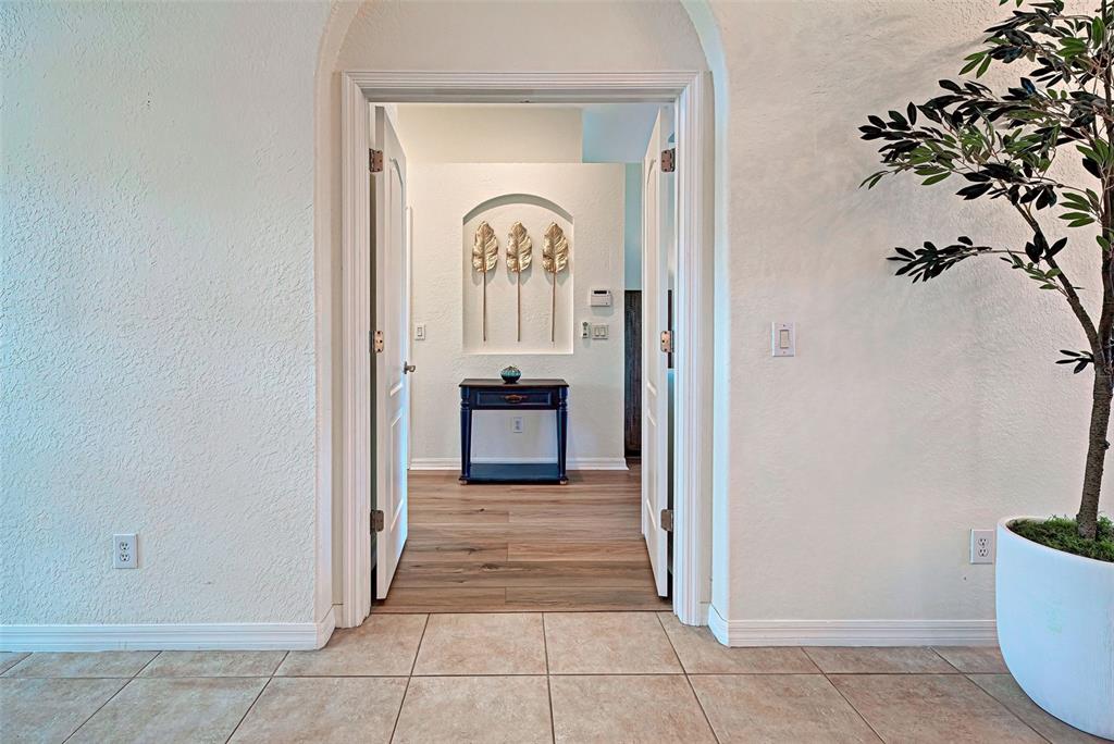 12086 Granite Woods Loop Venice, FL 34292 - Photo 49 of 85 a view of a entryway door with a living room