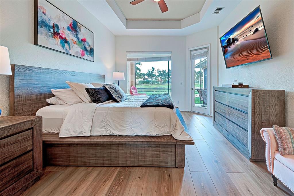 12086 Granite Woods Loop Venice, FL 34292 - Photo 7 of 85 a bed room with bed and window