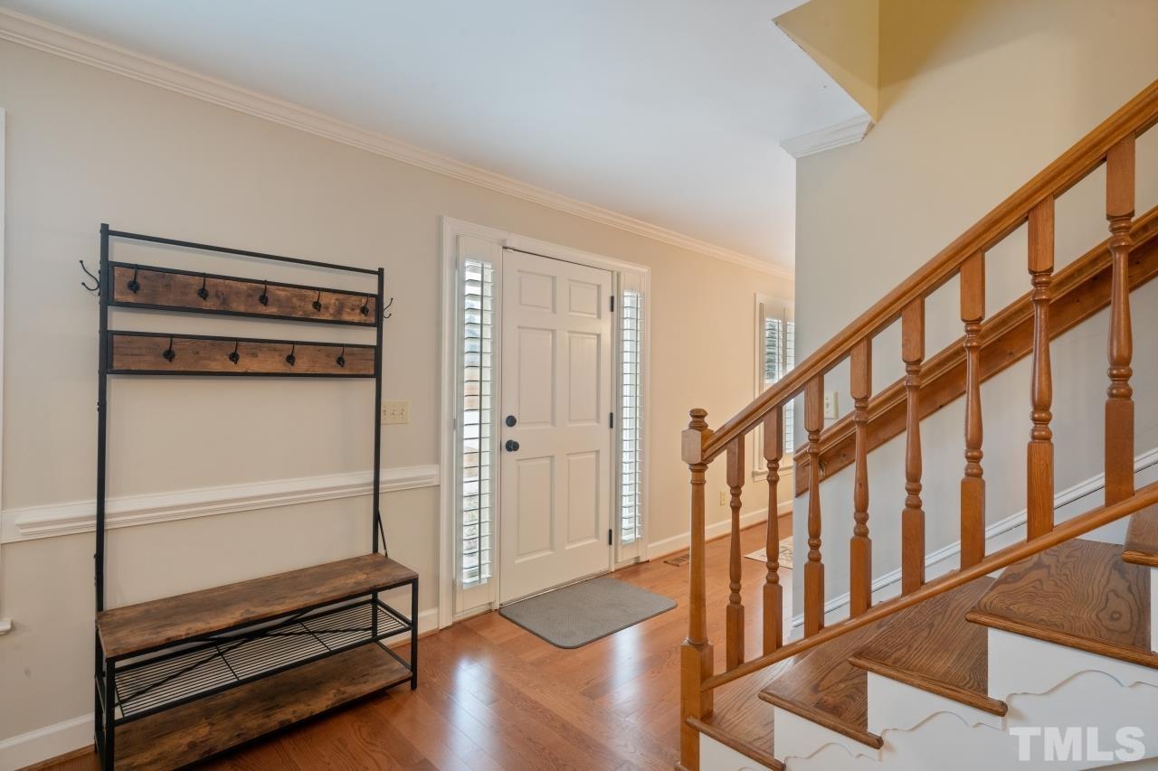1604 Habbot Drive Raleigh, NC 27603 - Photo 15 of 35 a view of an entryway with wooden floor