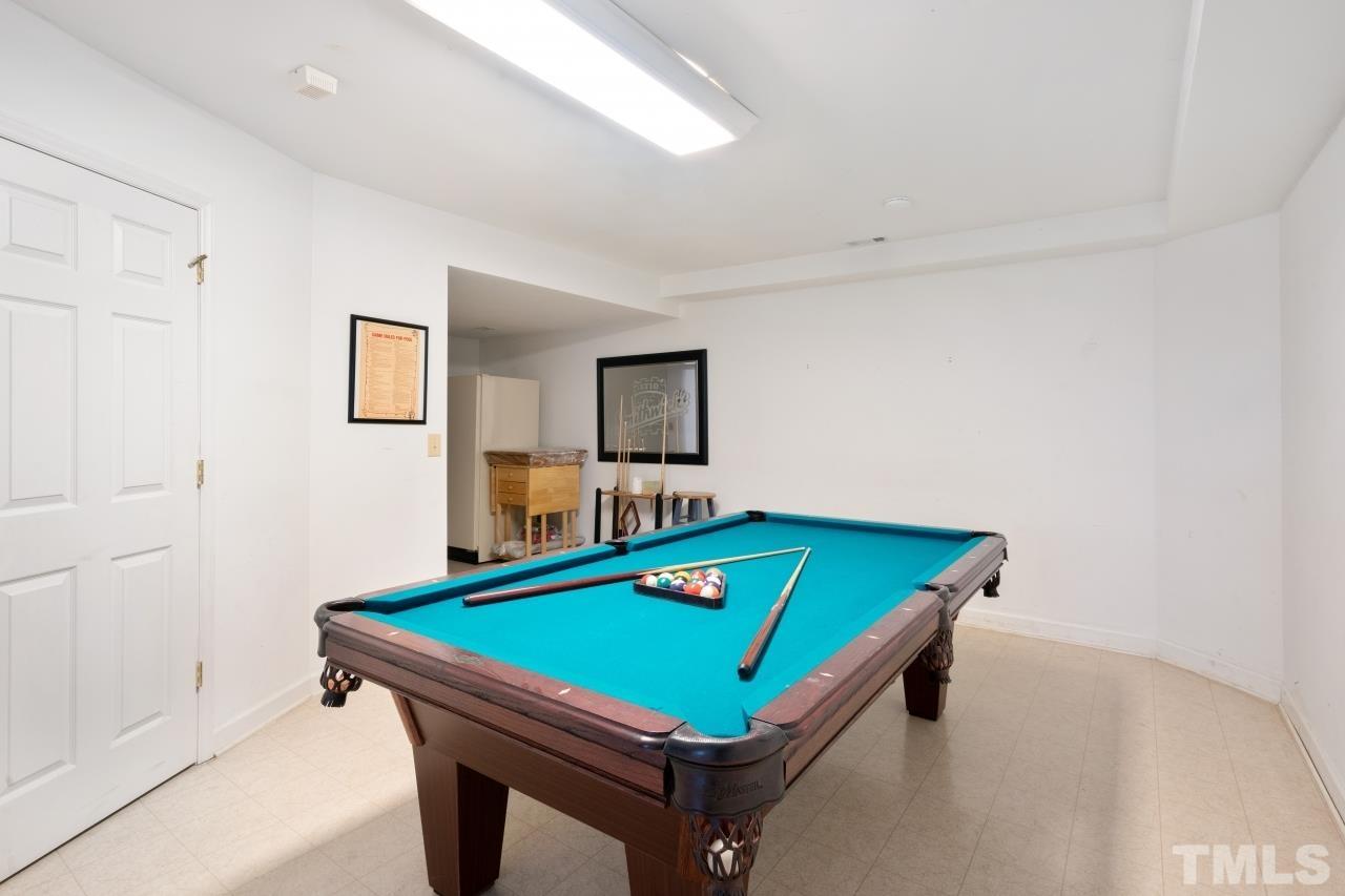 1604 Habbot Drive Raleigh, NC 27603 - Photo 17 of 35 a room with pool table and windows