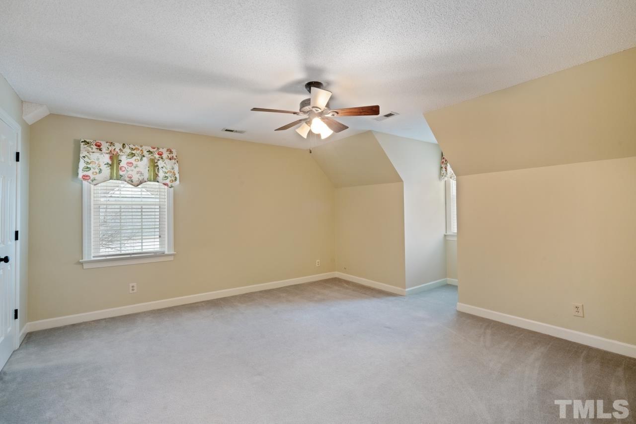 1604 Habbot Drive Raleigh, NC 27603 - Photo 21 of 35 an empty room with windows and fan