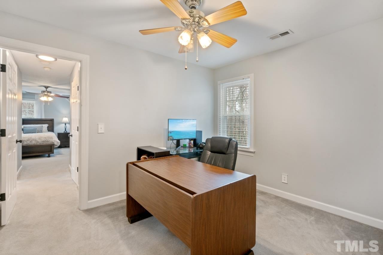 1604 Habbot Drive Raleigh, NC 27603 - Photo 27 of 35 a view of living room with furniture and a chandelier