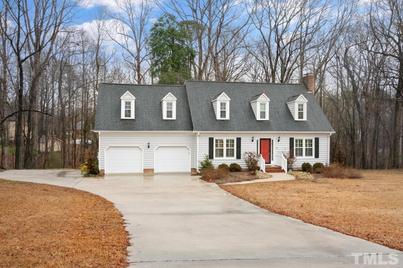 1604 Habbot Drive Raleigh, NC 27603 - Photo 7 of 35 a front view of a building with a yard