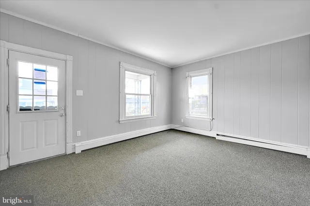 an empty room with windows