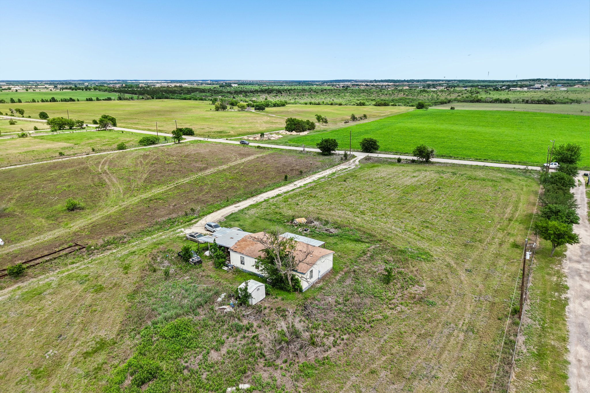 14204 Graef Road Buda, TX 78610 - Photo 10 of 11 a view of a field with an ocean view