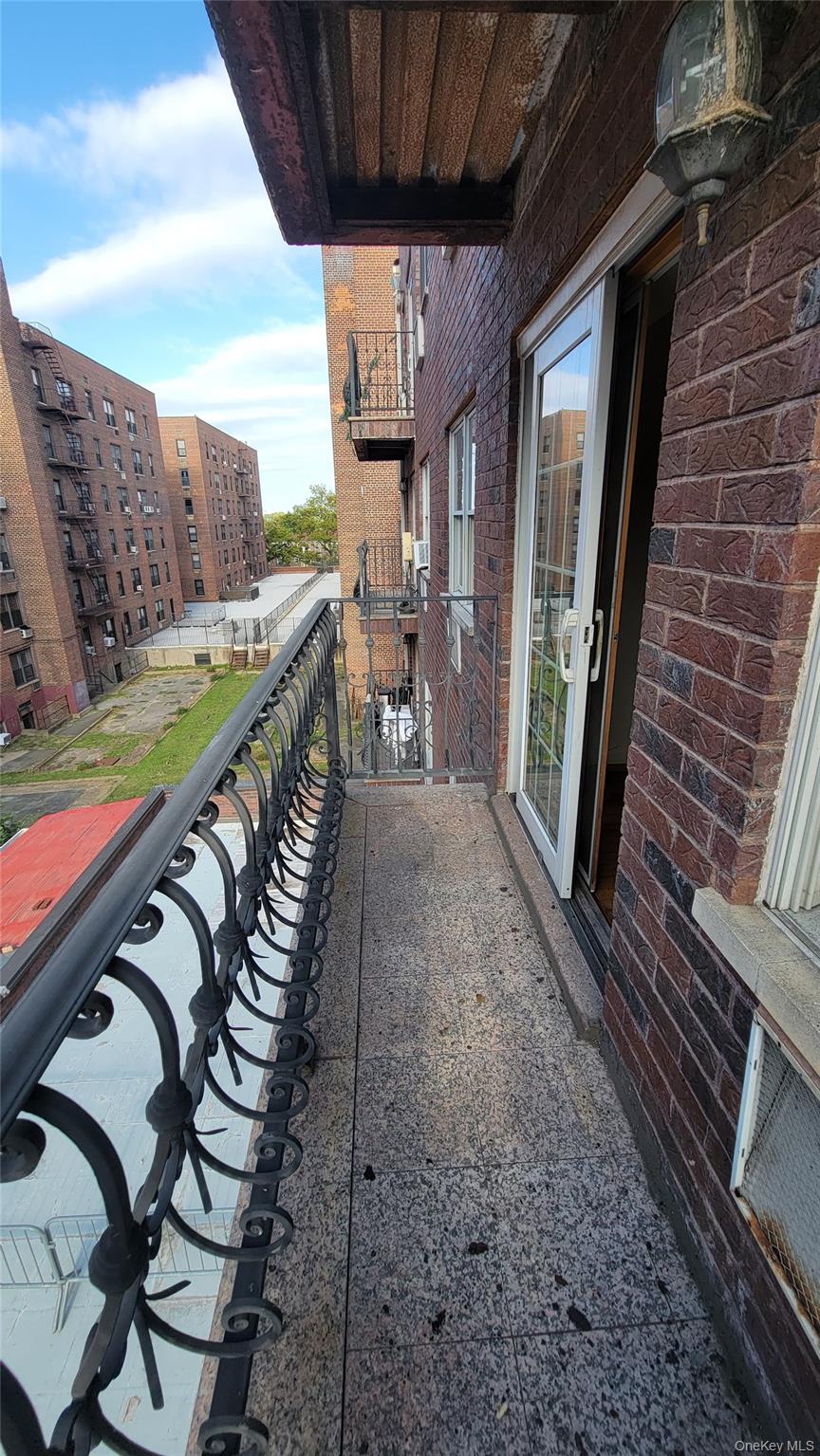 108-27 63rd Avenue, Unit 3B Queens, NY 11375 - Photo 9 of 17 a view of a balcony with furniture