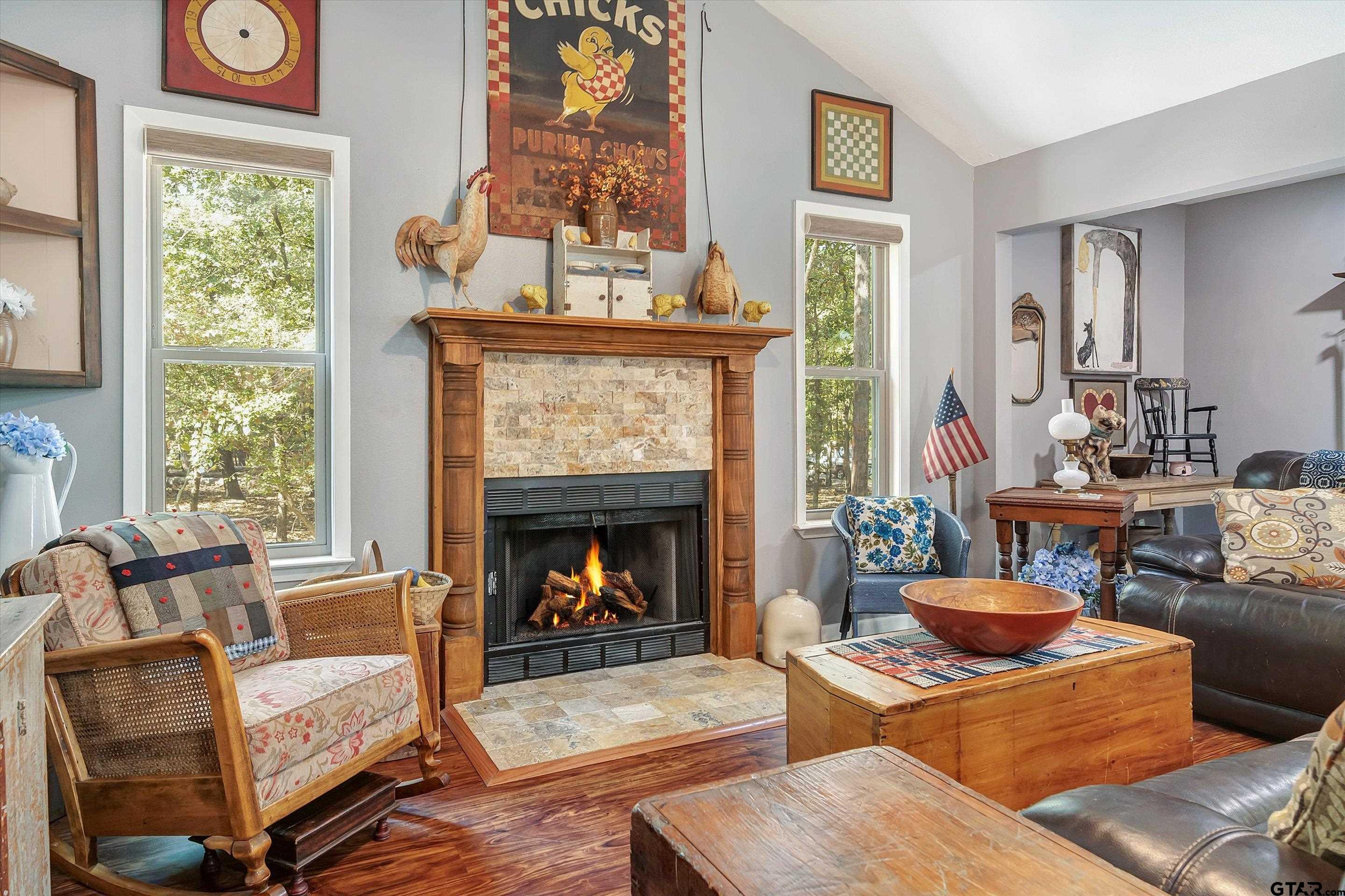 210 Magnolia Lane Holly Lake Ranch, TX 75765 - Photo 19 of 42 a living room with furniture and a fireplace