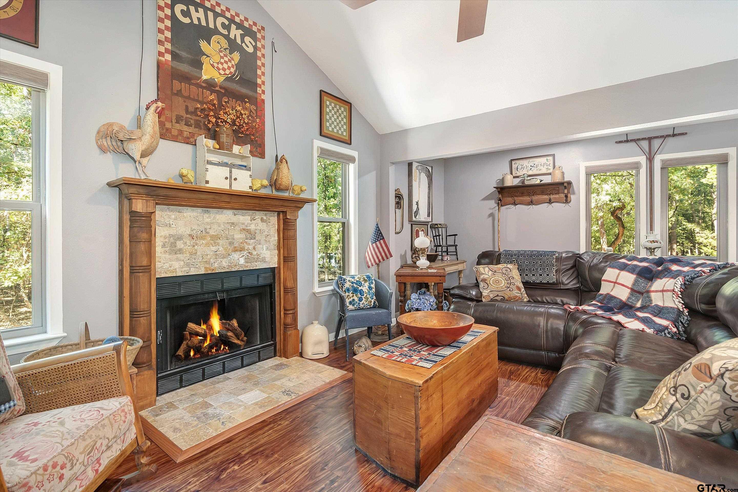 210 Magnolia Lane Holly Lake Ranch, TX 75765 - Photo 21 of 42 a living room with furniture and a fireplace