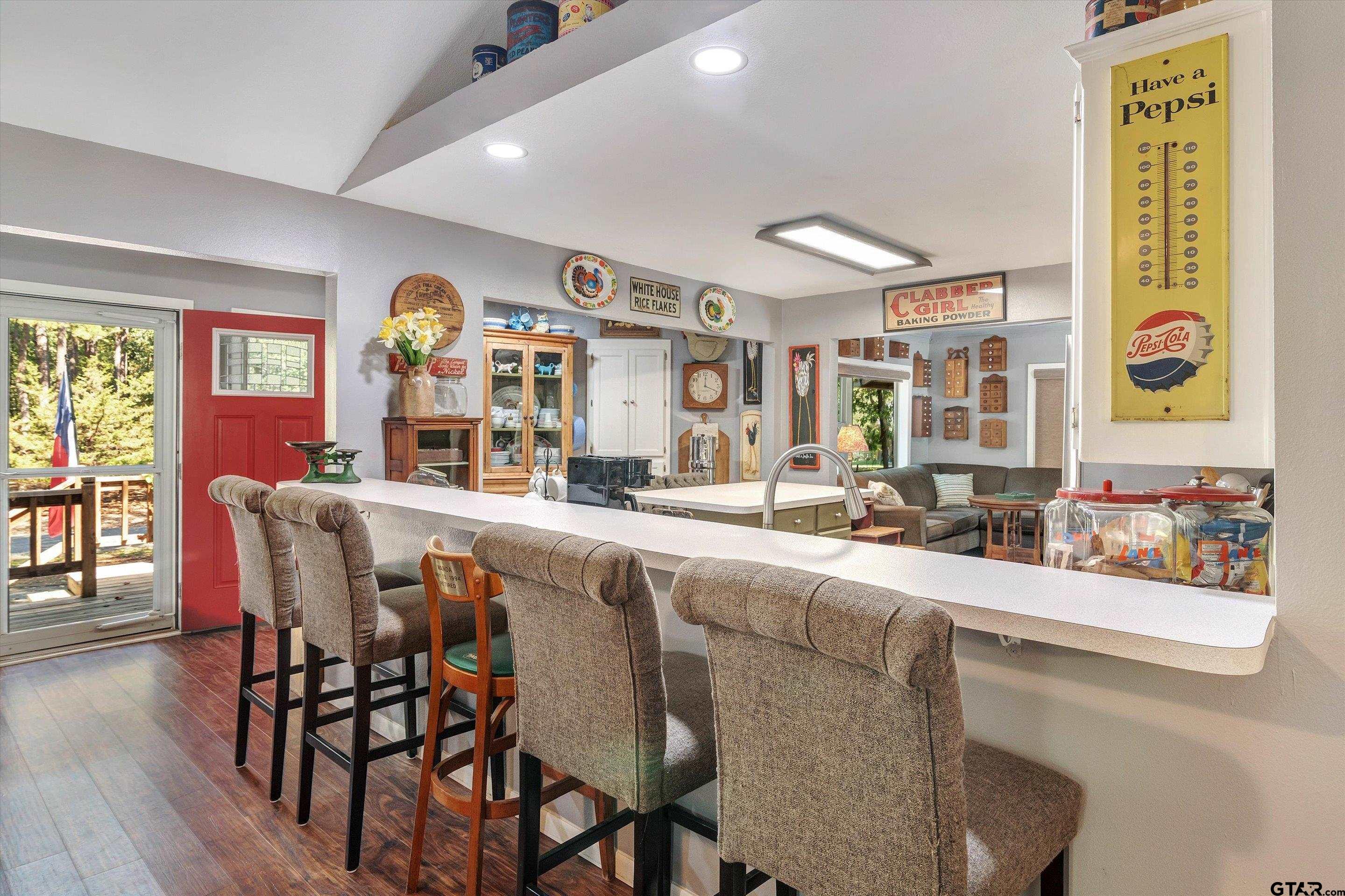 210 Magnolia Lane Holly Lake Ranch, TX 75765 - Photo 23 of 42 a dining table with chairs and window