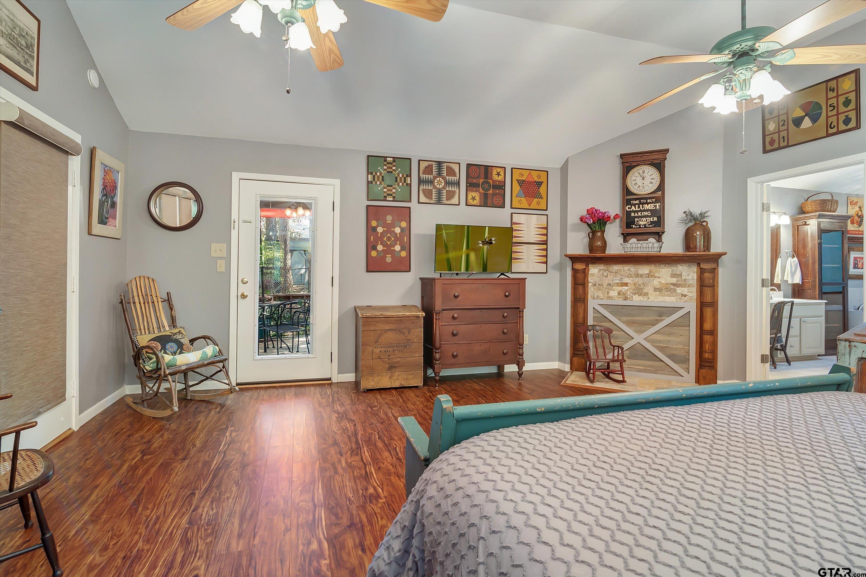 210 Magnolia Lane Holly Lake Ranch, TX 75765 - Photo 36 of 42 a bedroom with furniture and a window