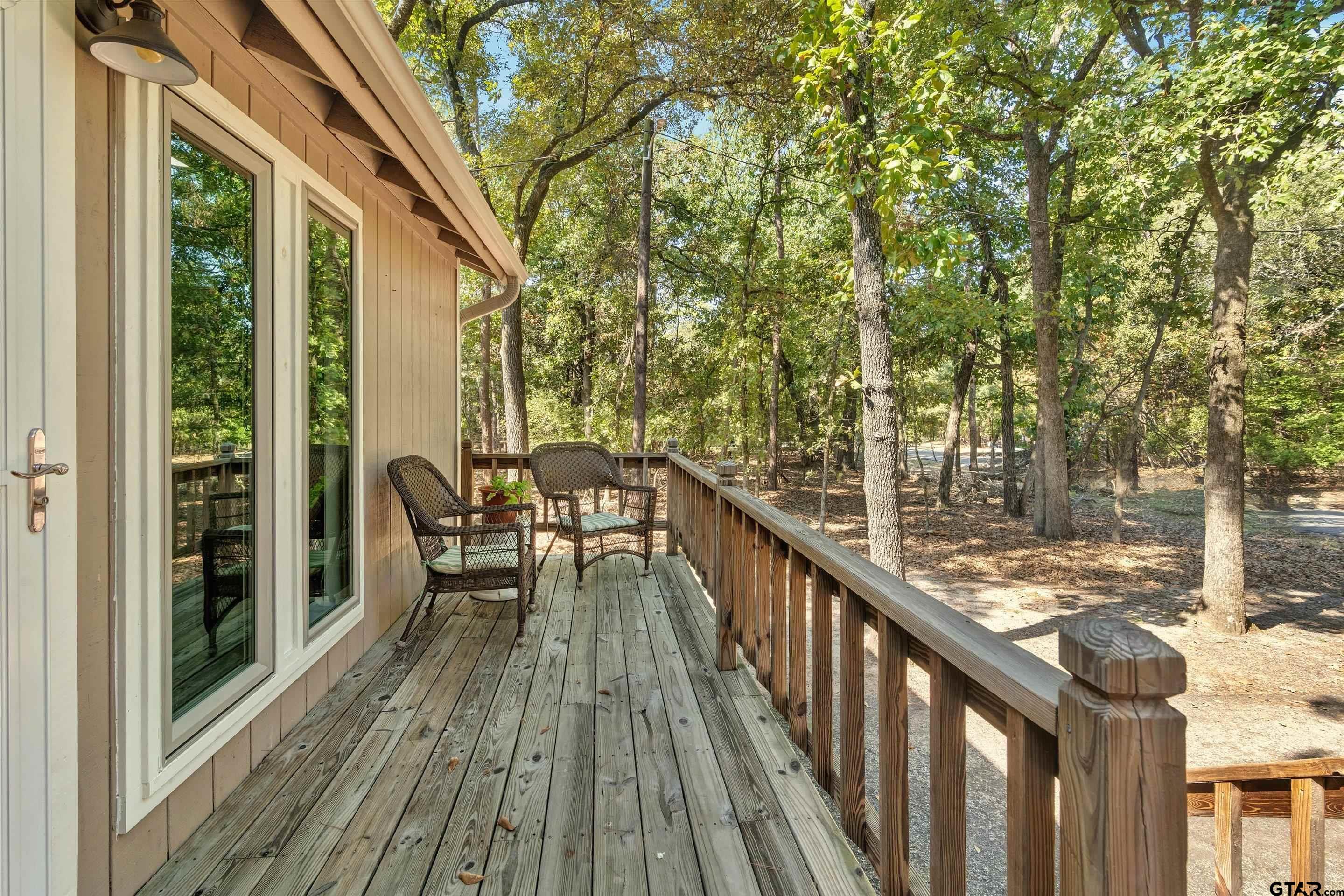 210 Magnolia Lane Holly Lake Ranch, TX 75765 - Photo 7 of 42 a view of balcony and deck