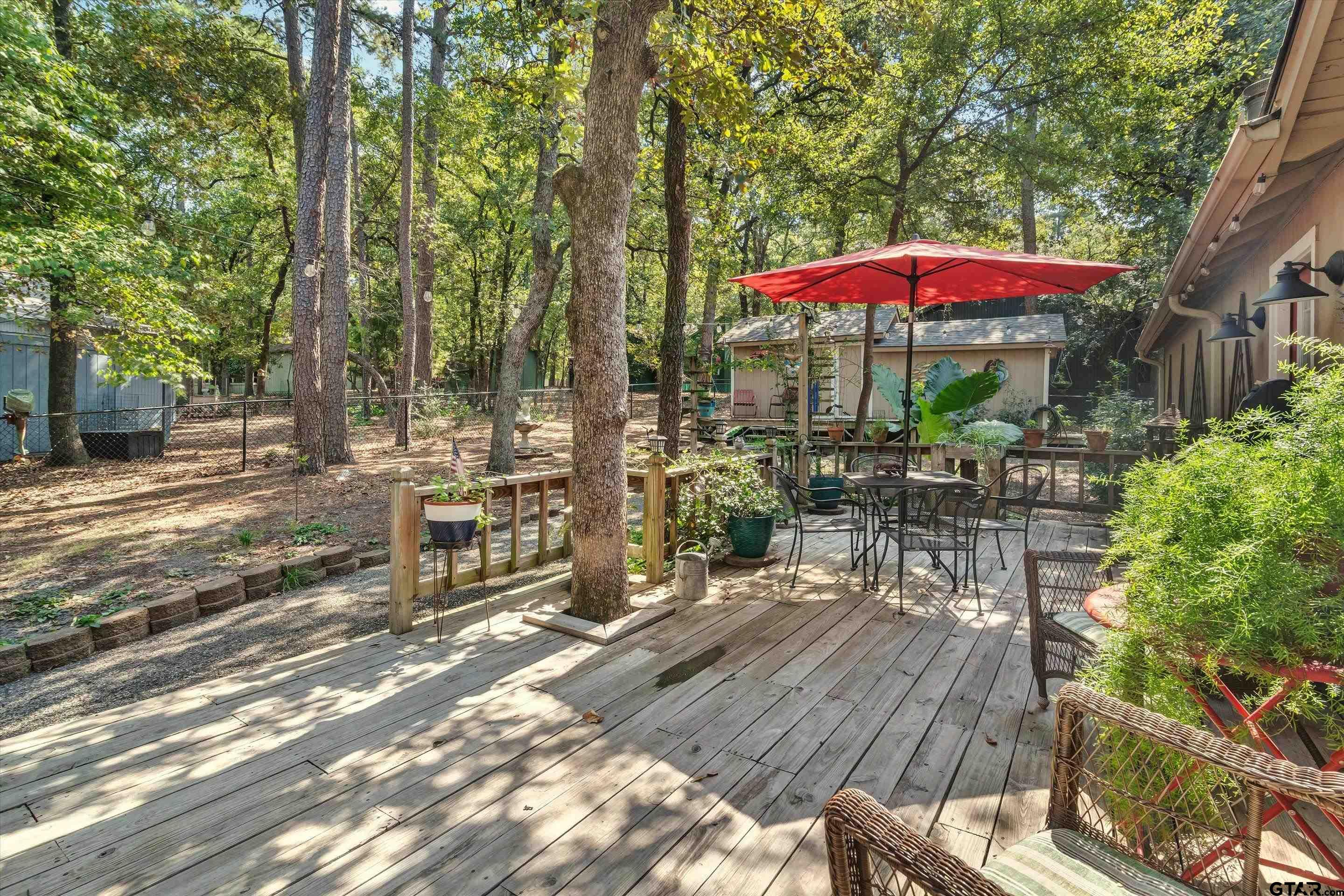 210 Magnolia Lane Holly Lake Ranch, TX 75765 - Photo 10 of 42 an outdoor space with patio