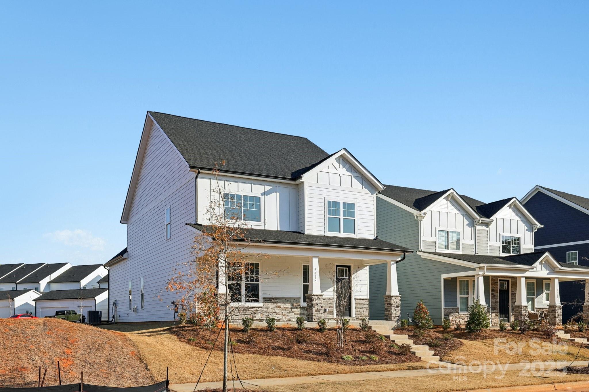 9612 Pointer Road, Unit 59 Huntersville, NC 28078 - Photo 3 of 43 a front view of a house