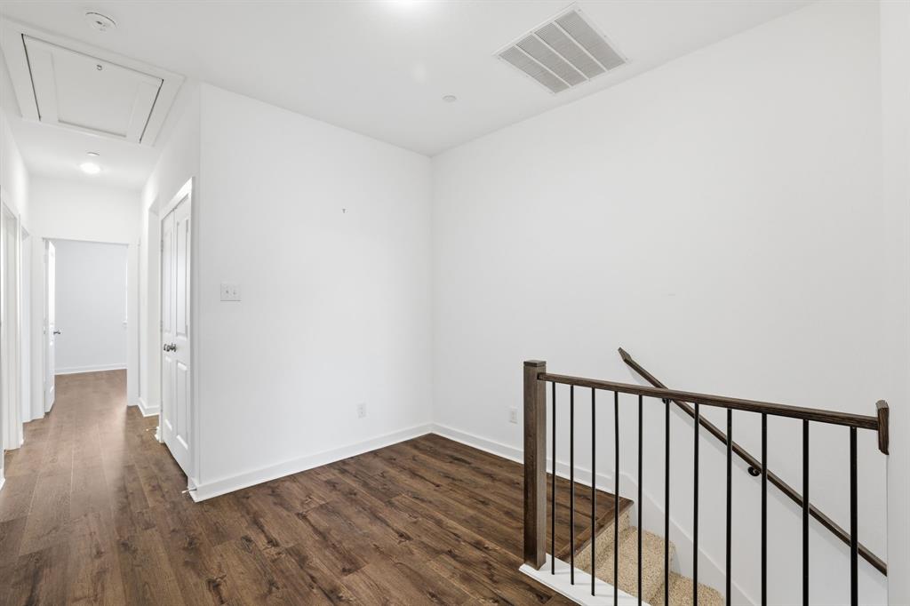 5832 Ridgeline Drive McKinney, TX 75070 - Photo 14 of 26 a view of hallway with wooden floor