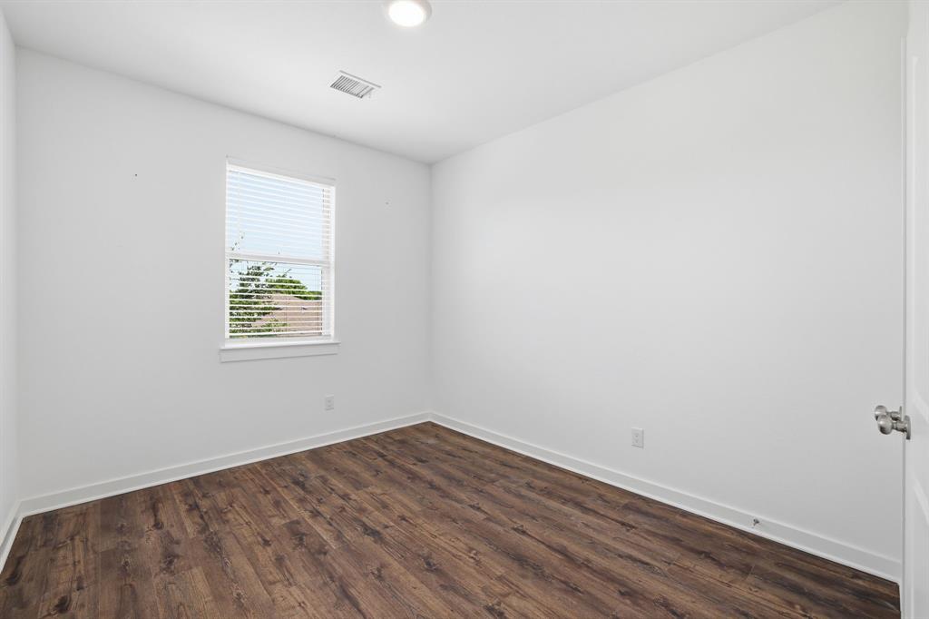 5832 Ridgeline Drive McKinney, TX 75070 - Photo 15 of 26 an empty room with a window