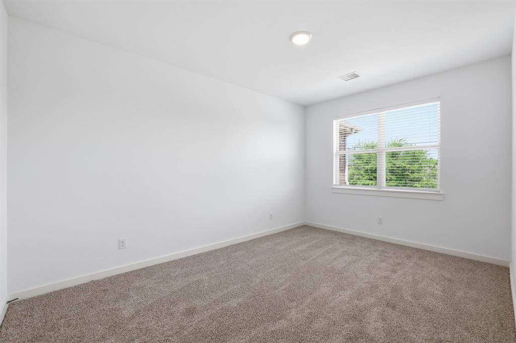 5832 Ridgeline Drive McKinney, TX 75070 - Photo 17 of 26 an empty room with a window