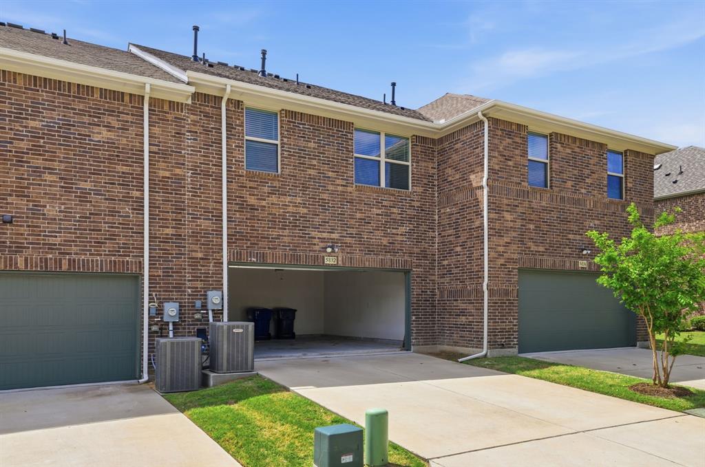 5832 Ridgeline Drive McKinney, TX 75070 - Photo 24 of 26 a front view of a house with garden