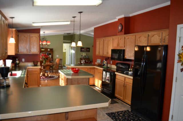 1286 Rutledge Ln. Lebanon, TN 37087 - Photo 1 of 18 Nice open kitchen w/tons of cabinet and counter space, all major appliances, pantry, and island.