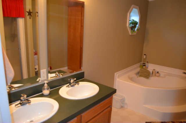 1286 Rutledge Ln. Lebanon, TN 37087 - Photo 12 of 18 .....w/double sinks, garden tub, separate shower, and linen closet.