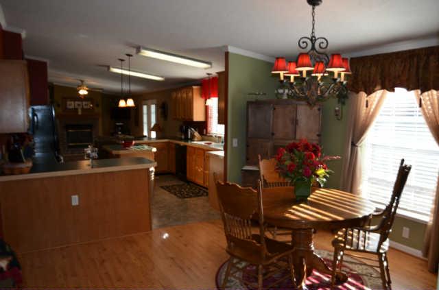 1286 Rutledge Ln. Lebanon, TN 37087 - Photo 8 of 18 Dining area is located on opposite end of kitchen is is open to living room.