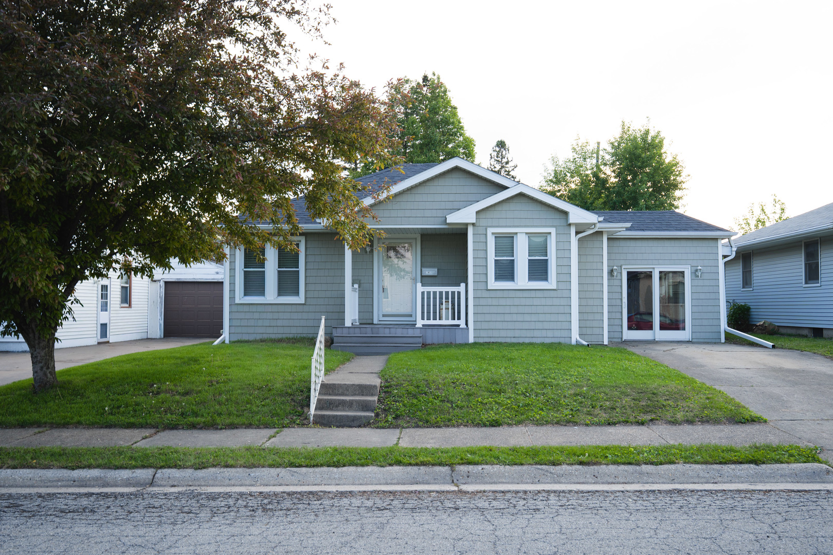 1561 Argyle Road LaSalle, IL 61301 - Photo 1 of 14 a front view of a house with a garden and trees
