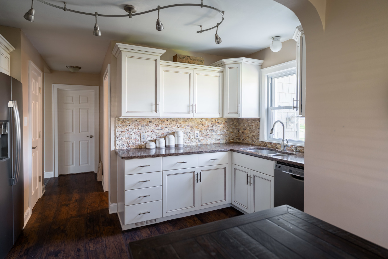 1561 Argyle Road LaSalle, IL 61301 - Photo 4 of 14 a kitchen with granite countertop white cabinets and white appliances