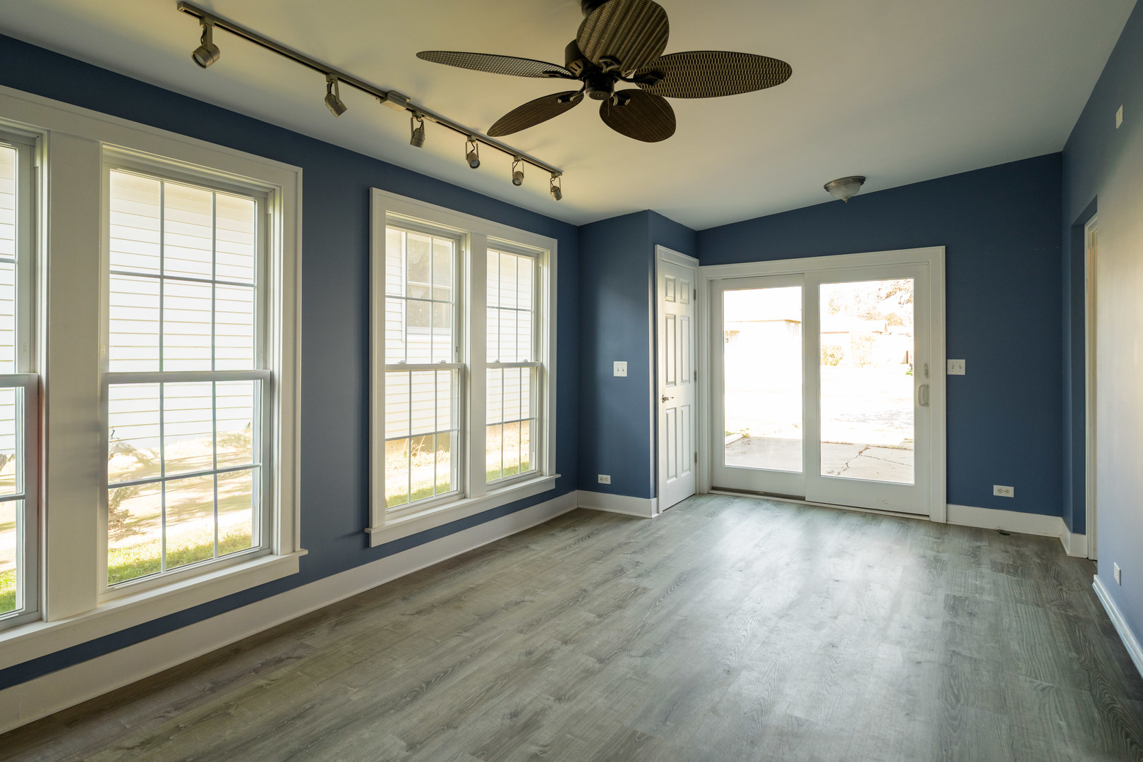 1561 Argyle Road LaSalle, IL 61301 - Photo 7 of 14 a view of an empty room with wooden floor and a window