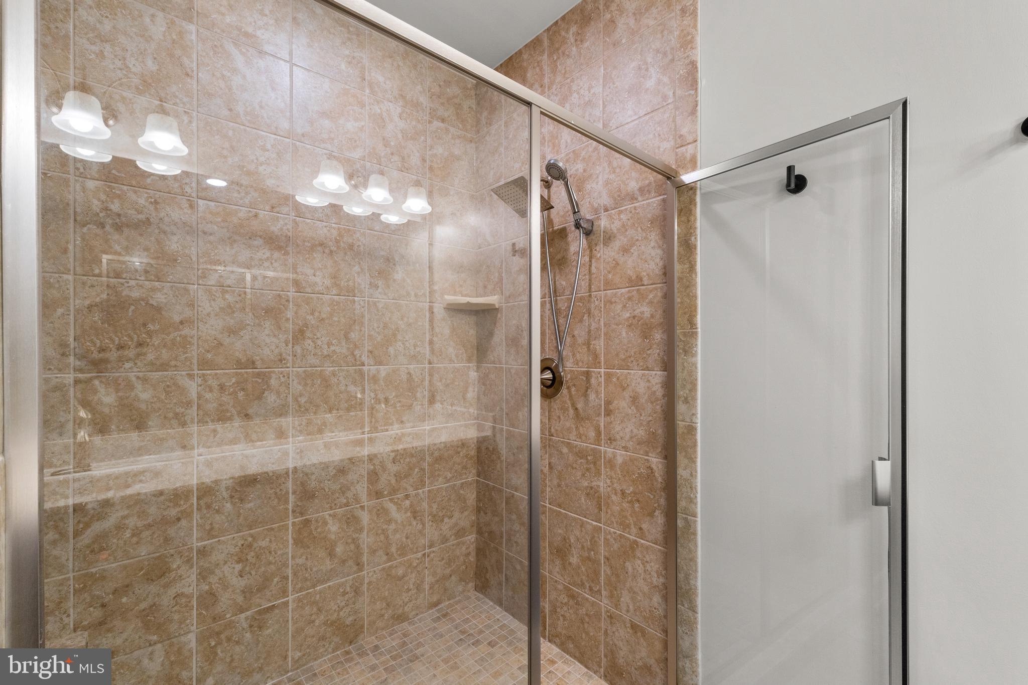 1815 Main Line Boulevard Alexandria, VA 22301 - Photo 31 of 47 Primary shower w/bench seating