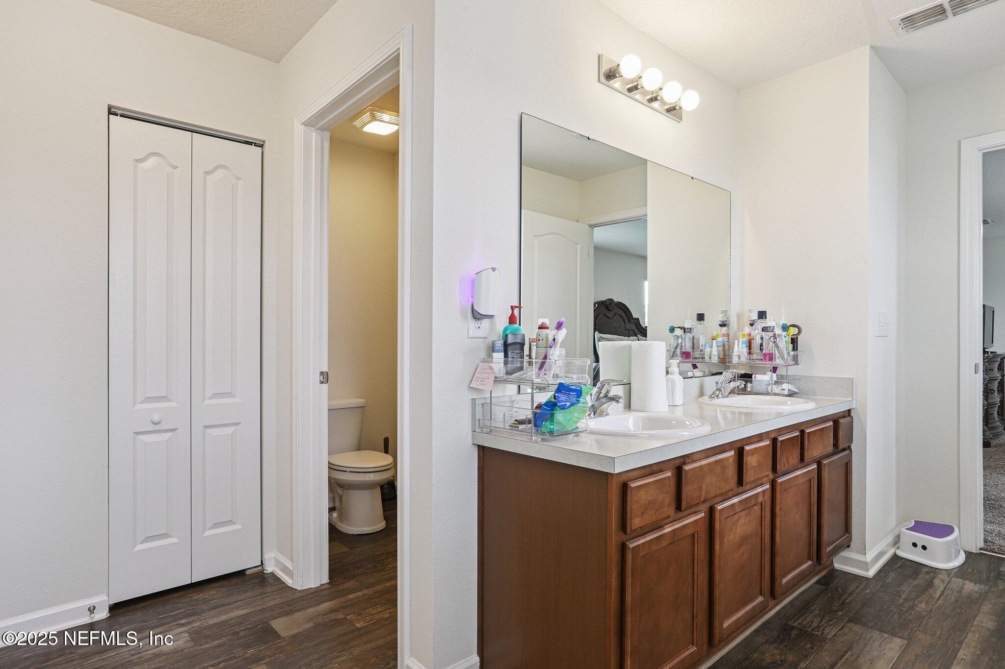 6829 Hanford Street Jacksonville, FL 32219 - Photo 17 of 24 a kitchen with a sink and a mirror