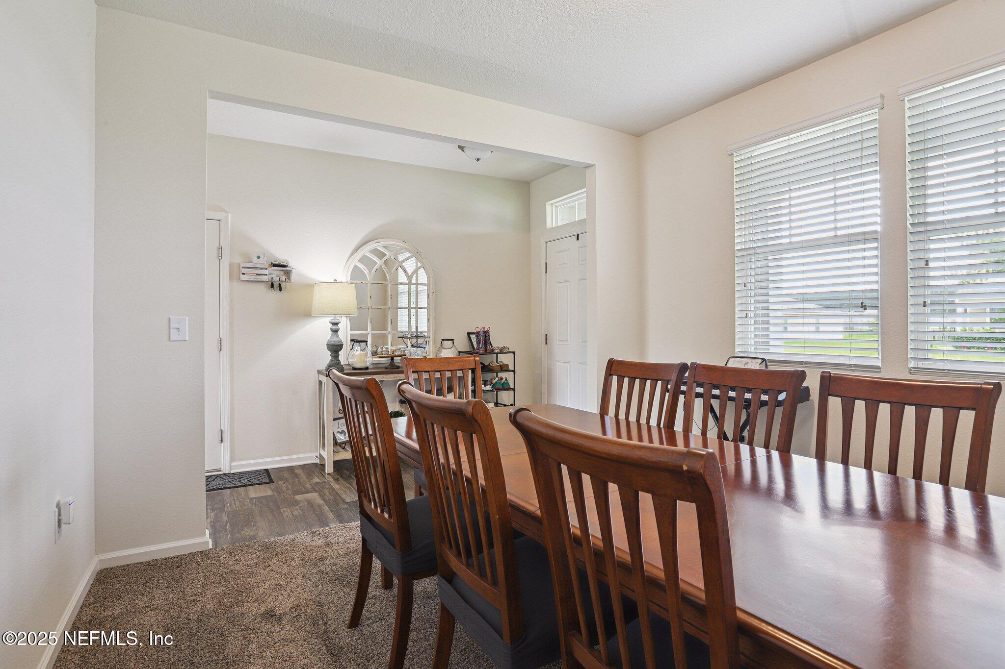 6829 Hanford Street Jacksonville, FL 32219 - Photo 6 of 24 a view of a dining room with furniture and window