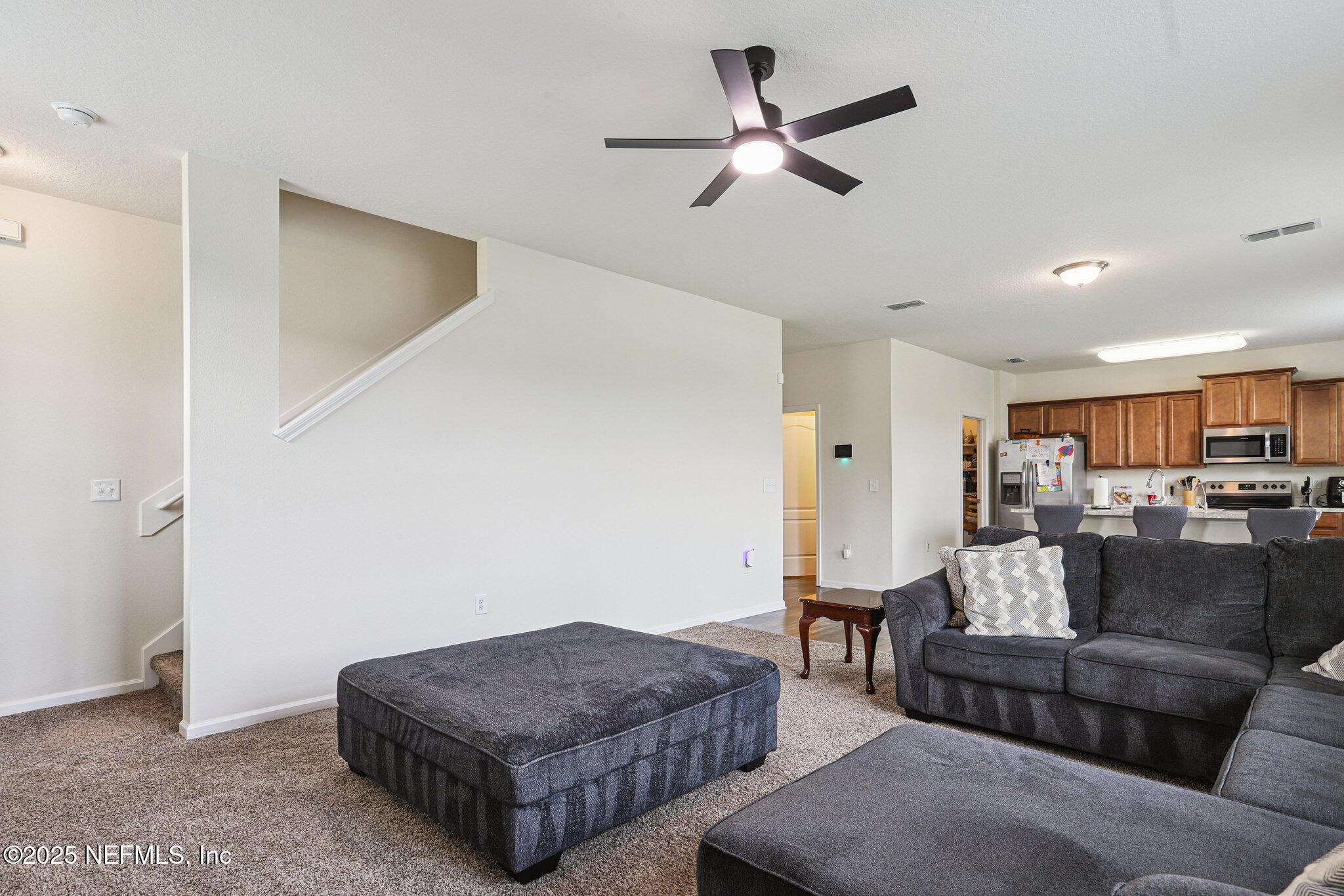 6829 Hanford Street Jacksonville, FL 32219 - Photo 9 of 24 a living room with furniture and a view of living room