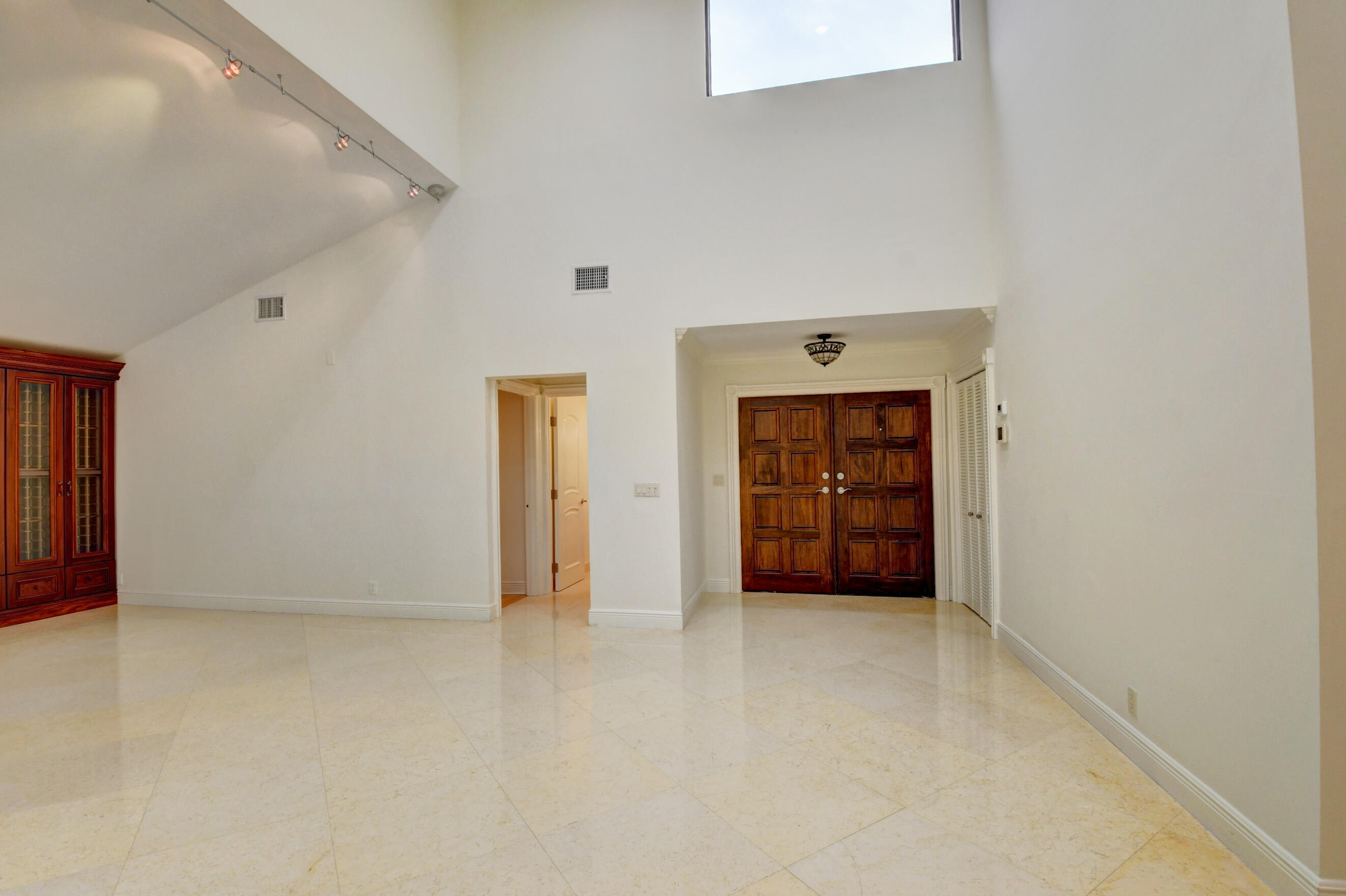 4535 Cocoplum Way Delray Beach, FL 33445 - Photo 13 of 50 Transom overhead window